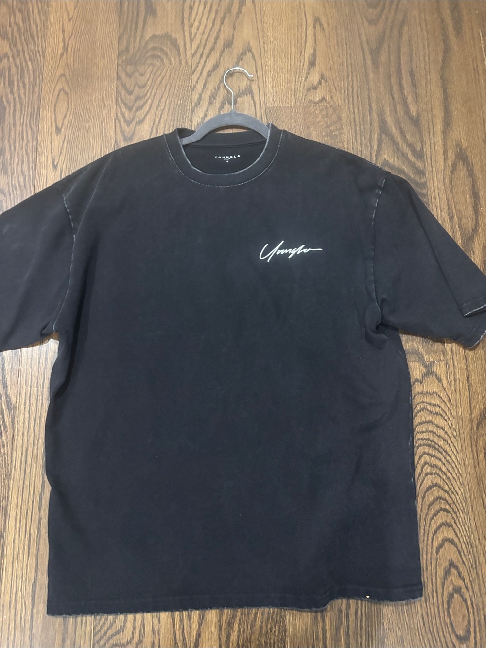 Undefeated Black Short-Sleeve Tee with White Script youngLa fits like medium